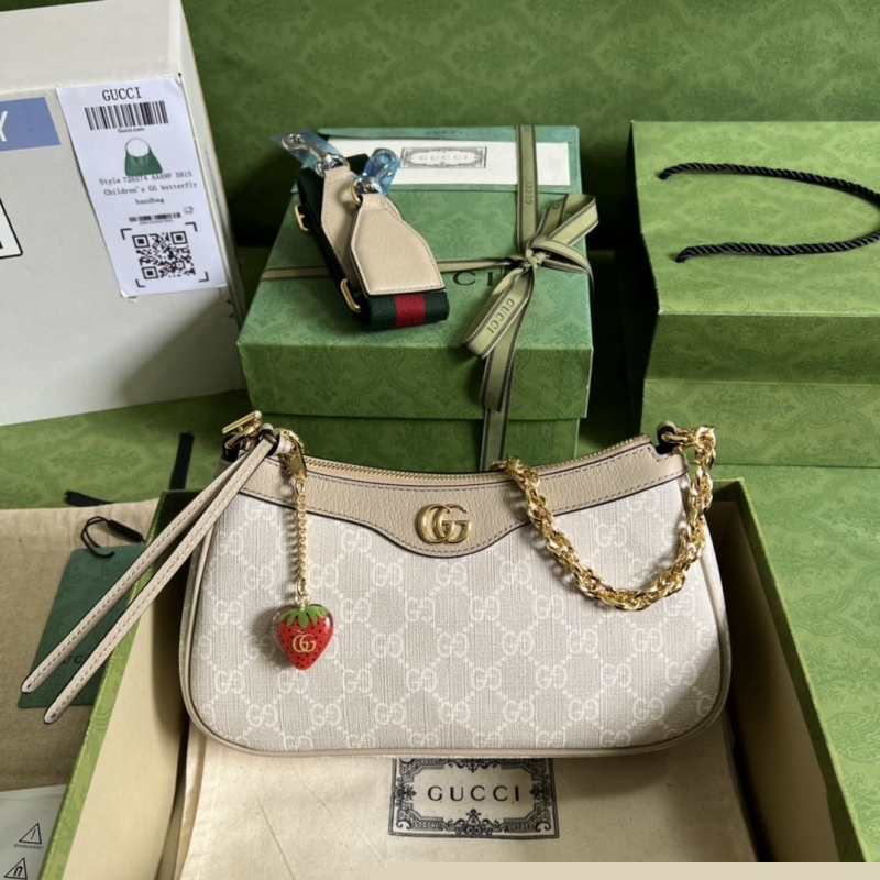 G*u*i top handle bags